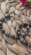 Load and play video in Gallery viewer, Black Obsidian Evil Eye
